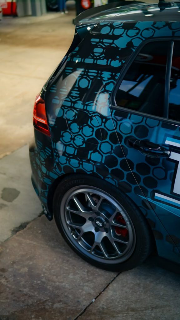 Close-up of a custom designed Volkswagen Golf with geometric patterns.